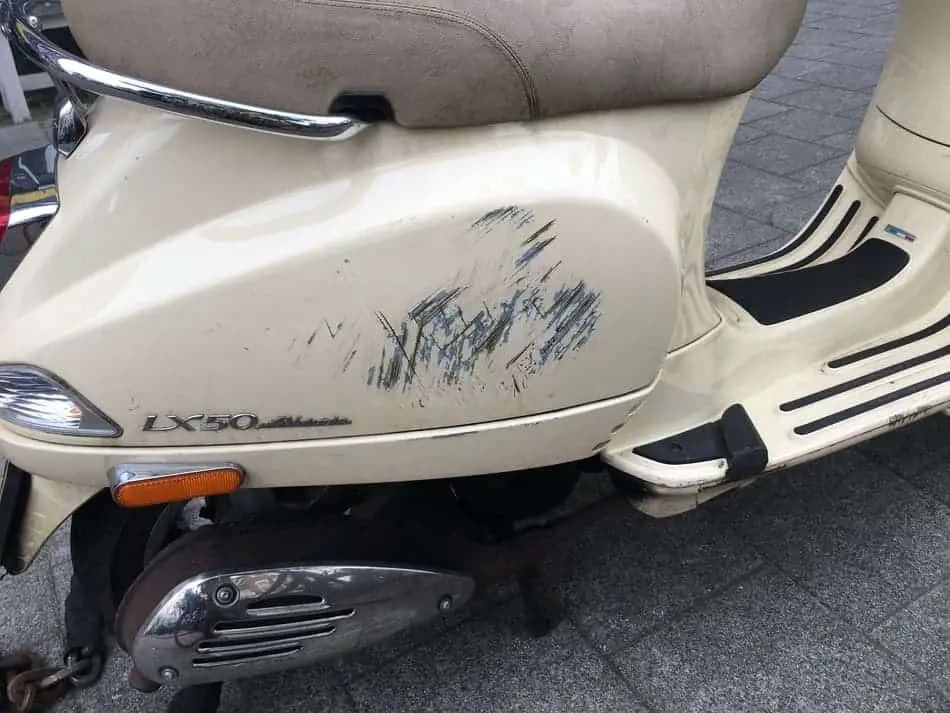 serious scratches on a Vespa LX50
