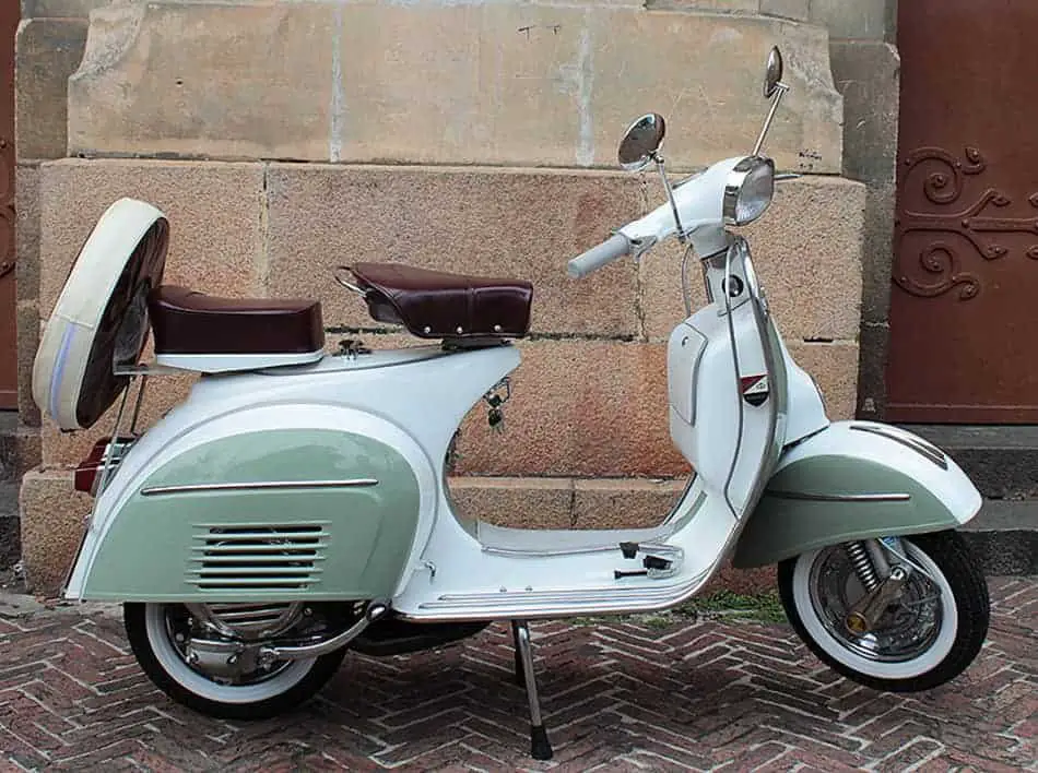 the two-color tone is typical for classic restored Vietnamese Vespas