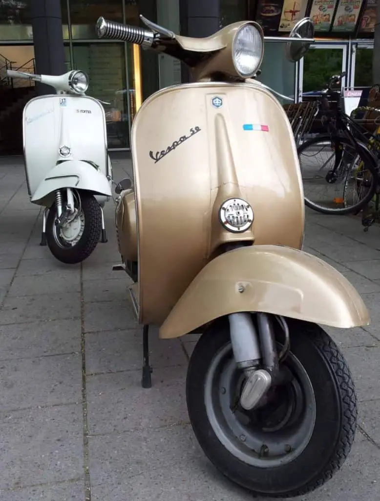 two classic vespas, small frame and large frame