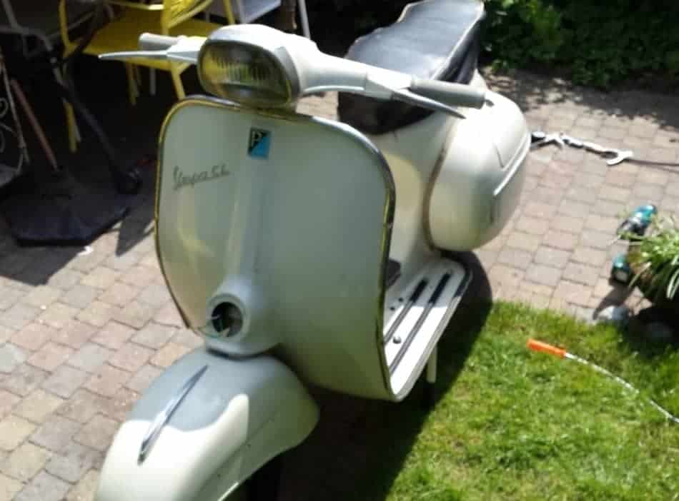 a restored classic vespa