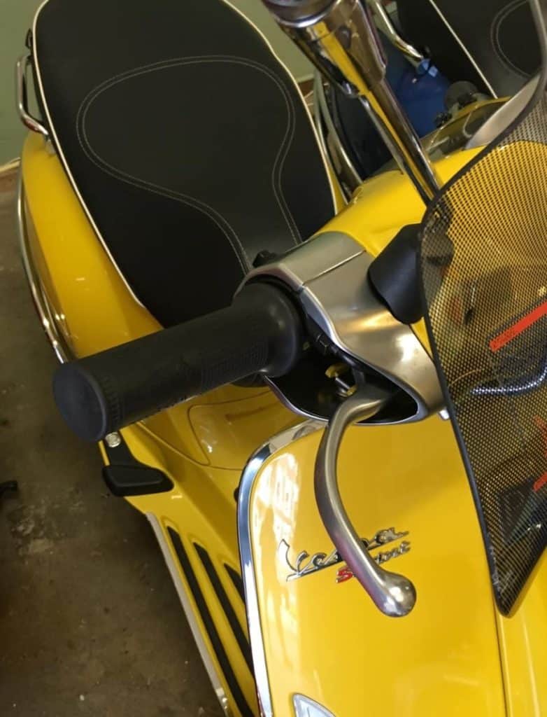 bent breaks on a yellow Vespa Sprint