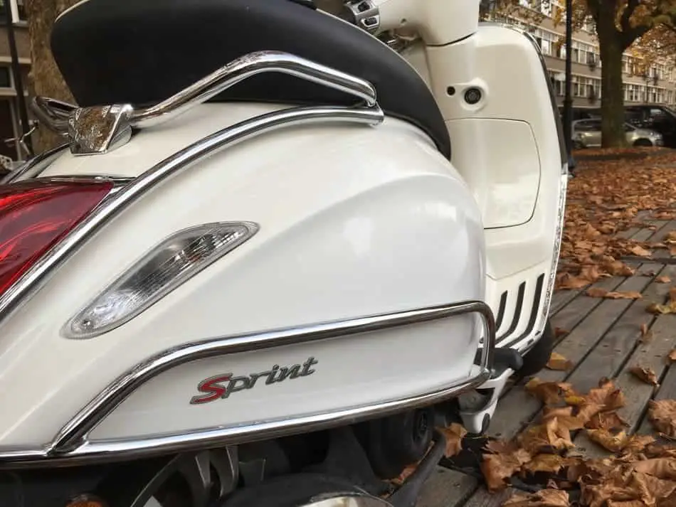 white Vespa Sprint 50cc looks best when cleaned properly