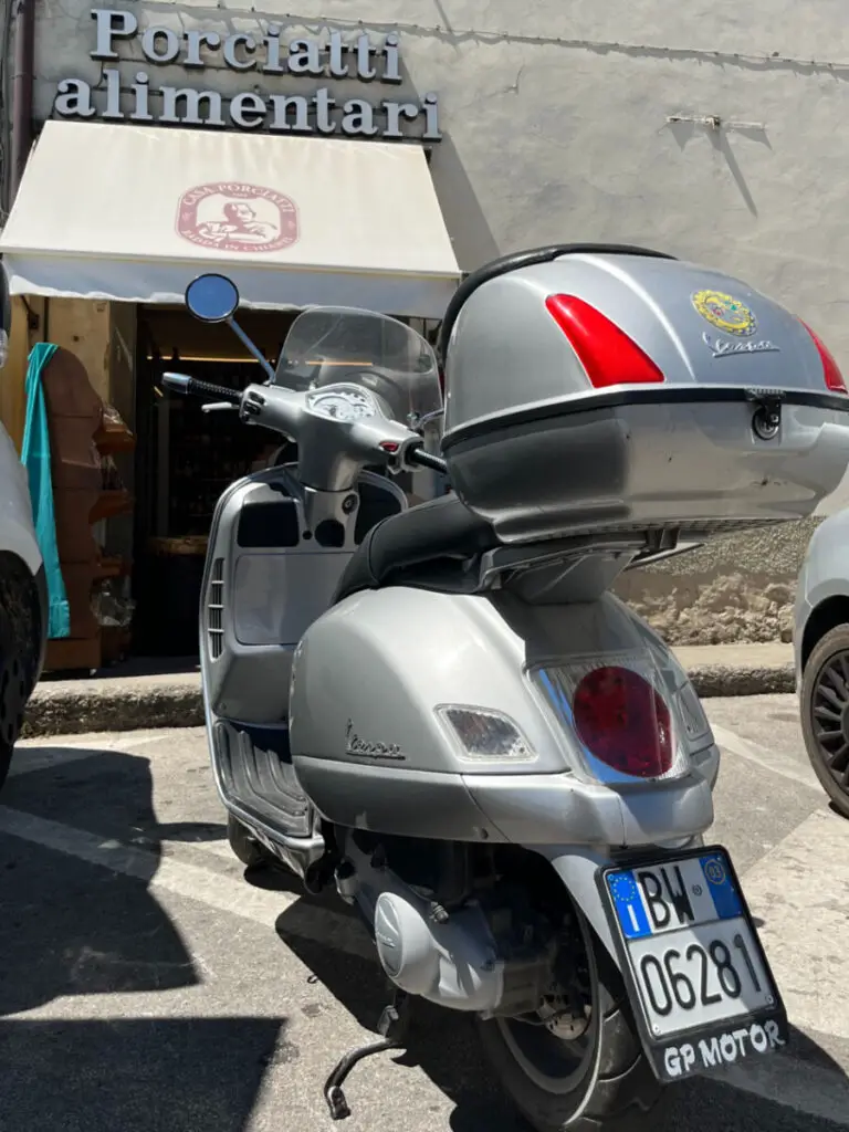 Vespa GTS with hard case to stow your helmet