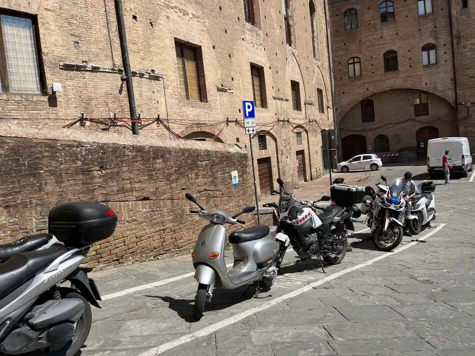 designated parking areas for vespas and motorcycles