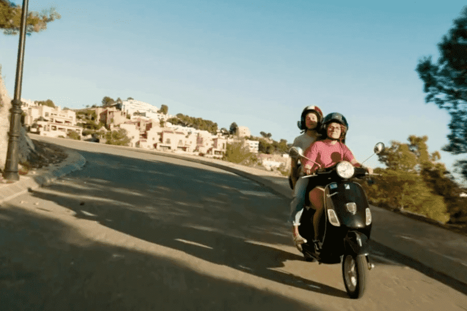 driving through Italy on a vespa