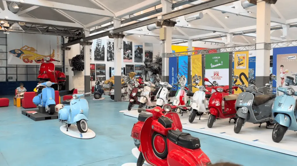 vespas displayed at the exhibition hall of the museum