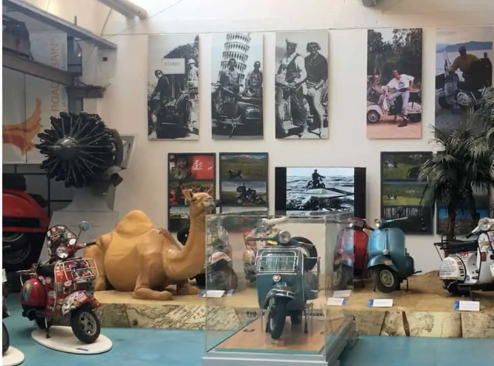collection of vespa that traveled all over the world